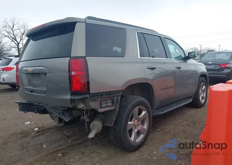 2019 Chevrolet Tahoe Lt z USA, uszkodzony, nr VIN 1GNSCBKC0KR299949
